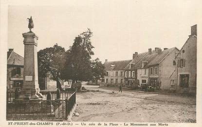 CPA FRANCE 63 " Ste Priest des Champs, Un coin de la place, le monument aux morts".