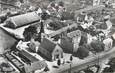 CPSM FRANCE 58 "Dornes, Vue aérienne sur les écoles, l'église et le marché".