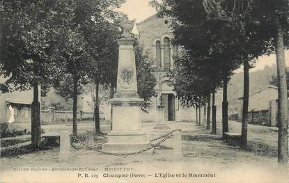 CPA FRANCE 38 " Champier, L'église et le monument aux morts"