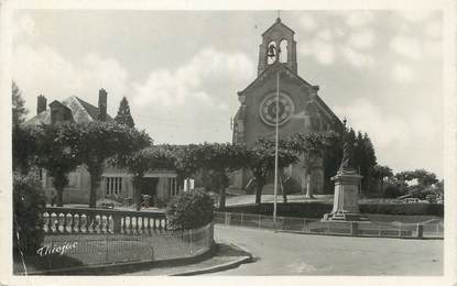 CPSM FRANCE 87 " Chateauneuf la Forêt, L'église et le monument aux morts'