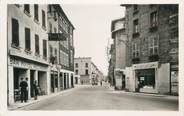 38 Isere CPA FRANCE 38 "Le Péage de Roussillon, Rue Grande et Place de la Halle"