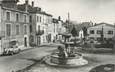 CPSM FRANCE 63 "Plauzat, La Fontaine aux Lions, le square et le monument aux morts"