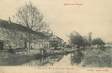 CPA FRANCE 88 " Docelles, Rue de la Gare et Canal de Vraichamp"