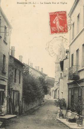 CPA FRANCE 43 " Dunières, La grande rue et l'église"