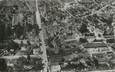 / CPSM FRANCE 89 "Migennes, vue aérienne sur l'avenue de la gare et le marché"