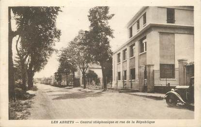 CPA FRANCE 38 " Les Abrets, Central téléphonique et Rue de la République"
