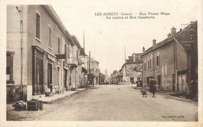 CPA FRANCE 38 " Les Abrets, Rue Victor Hugo et Rue Gambetta"