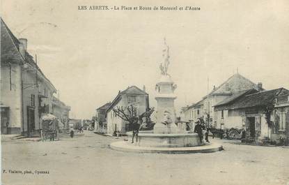 CPA FRANCE 38 " Les Abrets, La place et la Route de Morestel et d'Aoste"