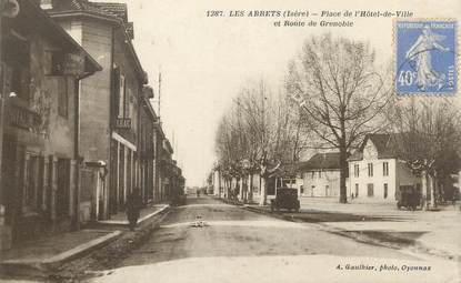 CPA FRANCE 38 " Les Abrets, Place de l'Hôtel de Ville et Route de Grenoble"