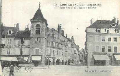 CPA FRANCE 39 "Lons Le Saunier les Bains, entrée de la rue du commerce et le Beffroi"