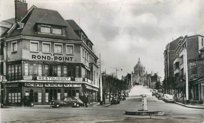 CPSM FRANCE 14 "Lisieux, rond Point et avenue Sainte Thérèse"