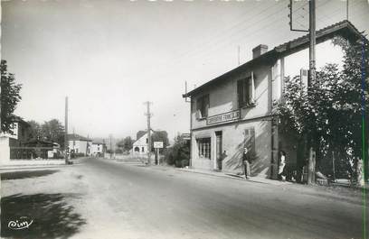 CPSM FRANCE 38 "Saint Clair du Rhône, route du Péage et coopérative Francolor"