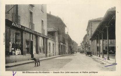 CPA FRANCE 38 "Saint Etienne de Saint Geoirs, grande rue et halles publiques"