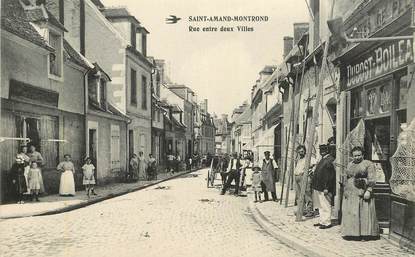 CPA FRANCE 18 "Saint Amand Montrond, rue entre deux villes, tabac Dubost Boileau"