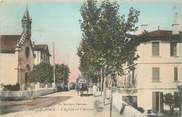 06 Alpe Maritime CPA FRANCE 06 "Golfe Juan, Eglise et avenue"