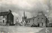 29 Finistere / CPSM FRANCE 29 "Scrignac, la place du Bourg, l'église et le monument aux morts"