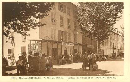 CPA FRANCE 06 "Isola sur Tinée, entrée du village et le Touring Hotel"