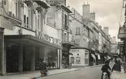 03 Allier / CPSM FRANCE 03 "Moulins, le magasin des Nouvelles Galeries et la rue d'Allier" / COMMERCE