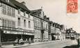 CPSM FRANCE 50 "Pontorson, la rue Saint Michel, le Grand Bazar"