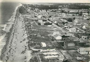 / CPSM FRANCE 50 "Passous, vue générale aérienne de la plage et les villas vers Coutainville"