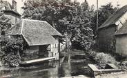 27 Eure / CPSM FRANCE 27 "Damville, puiseau et lavoir sur l'Iton"