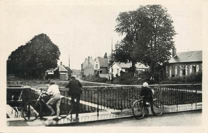 / CPSM FRANCE 80 "Ham, rue du port, prise du pont"