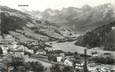 / CPSM FRANCE 74 "Le Grand Bornand, vue générale, chaîne des Aravis et pointe Percée"