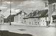 / CPSM FRANCE 01 "Gex, place du Faubourg et le groupe scolaire"