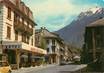 / CPSM FRANCE 73 "Saint Michel de Maurienne, la grand'rue, hôtel Garages"