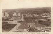 01 Ain / CPA FRANCE 01 "Saint Maurice de Beynost, une vue de la cité de la Soie" / TRAVAILLEURS INDOCHINOIS