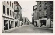 38 Isere / CPSM FRANCE 38 "Le Péage de Roussillon, rue Grande et place de la Halle"